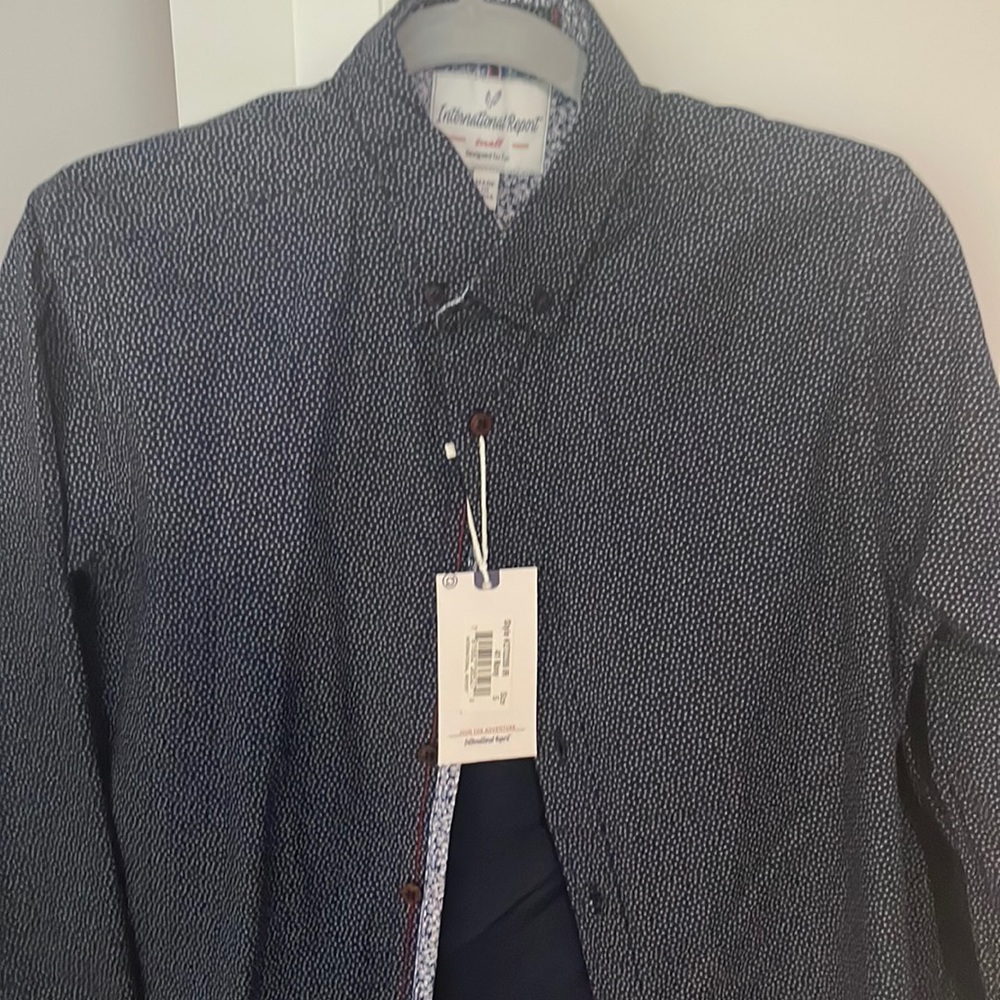 New Men’s long sleeve navy blue shirt with small white design-size small.